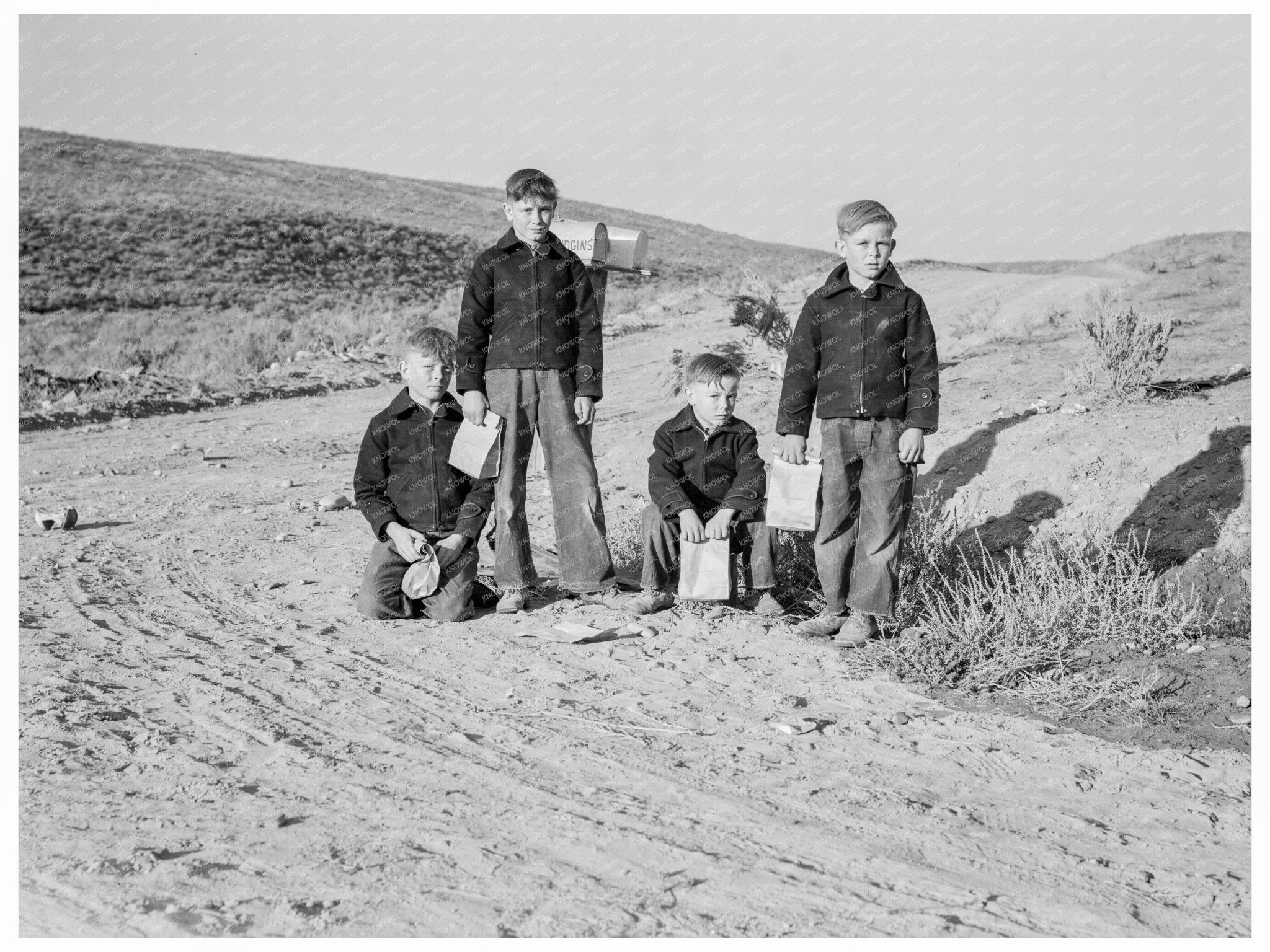 Boys Waiting for School Bus Dead Ox Flat Oregon 1939 - Available at KNOWOL