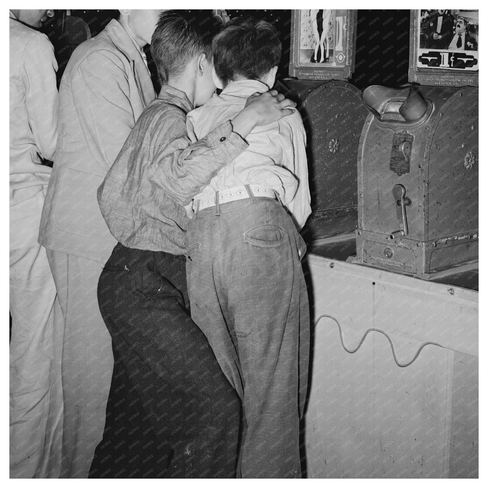 Boys Watching Penny Movies at South Louisiana State Fair 1938 - Available at KNOWOL