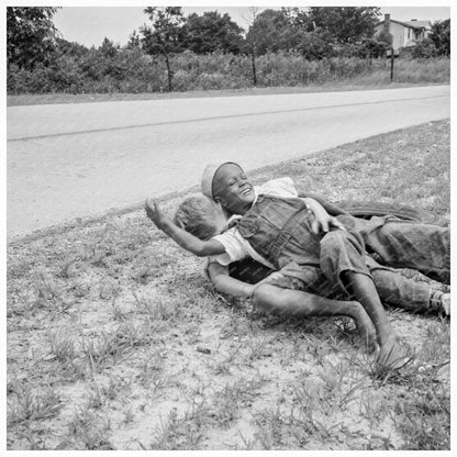 Boys Wrestling by Roadside Person County North Carolina 1939 - Available at KNOWOL