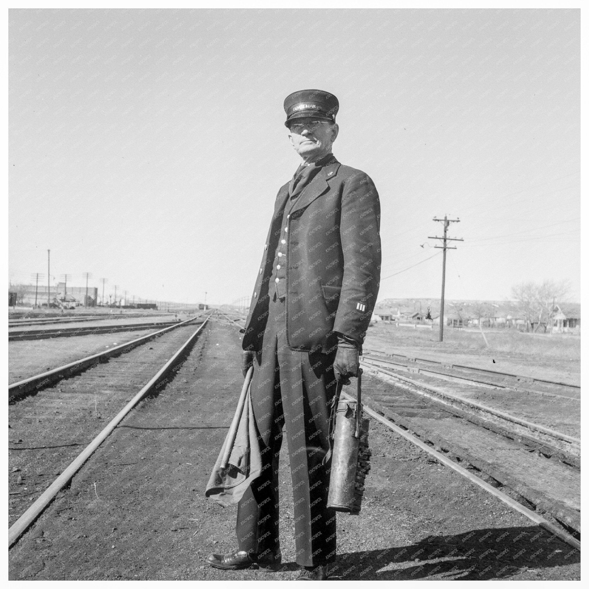 Brakeman on Train Nevada June 1939 Black and White Photo - Available at KNOWOL