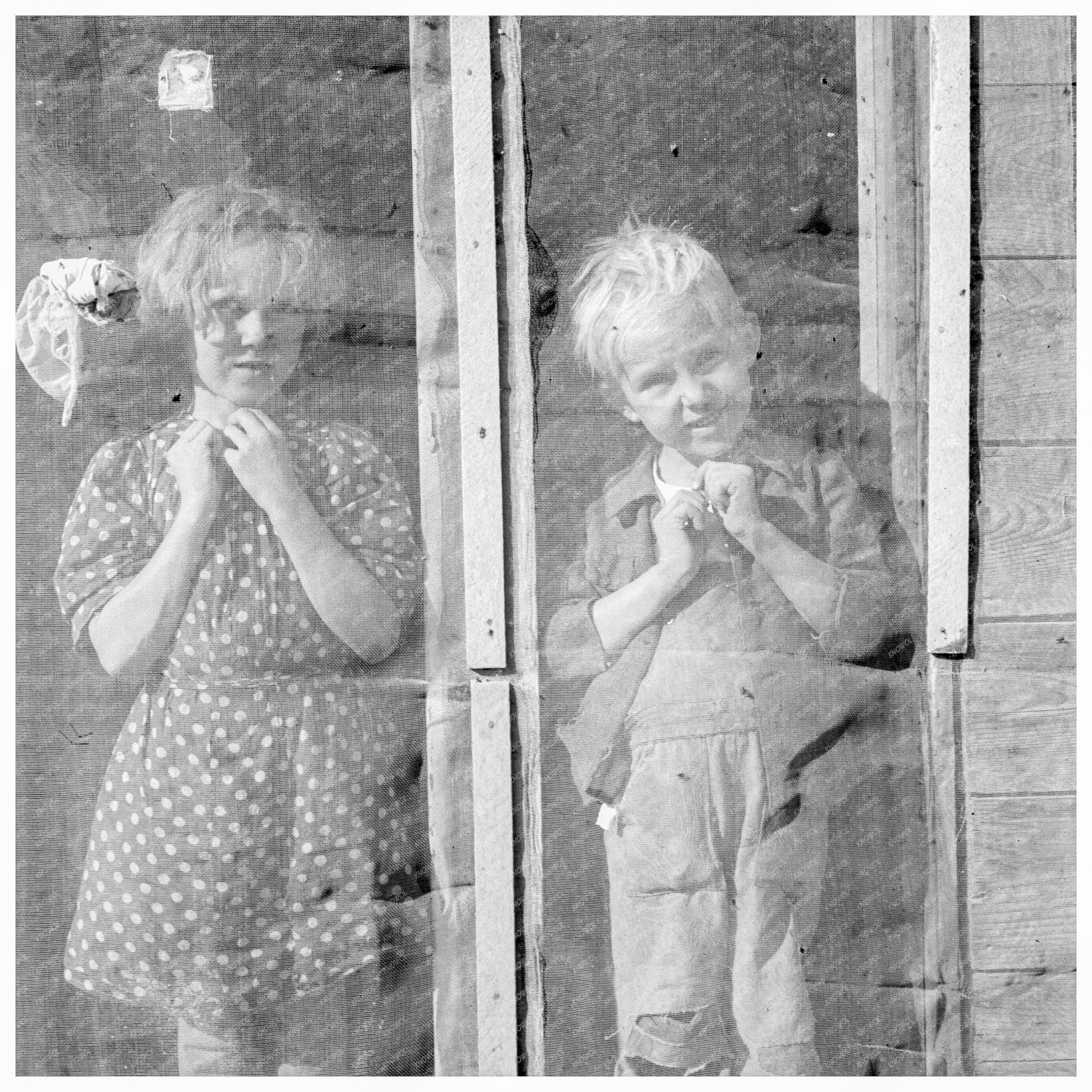 Browning Children in Doorway Dead Ox Flat Oregon 1939 - Available at KNOWOL