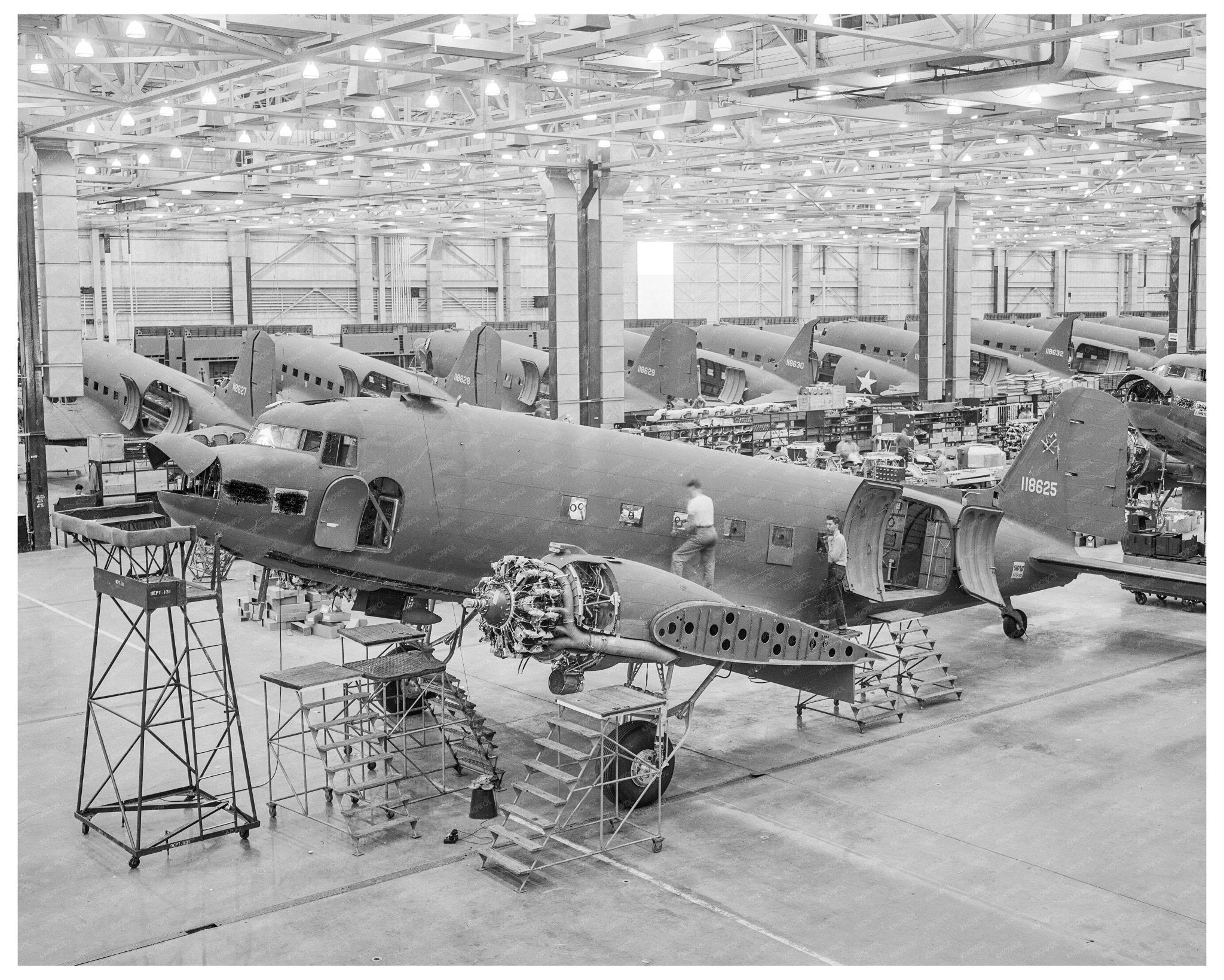 C - 47 Transport Planes Await Wing Installation October 1942 - Available at KNOWOL