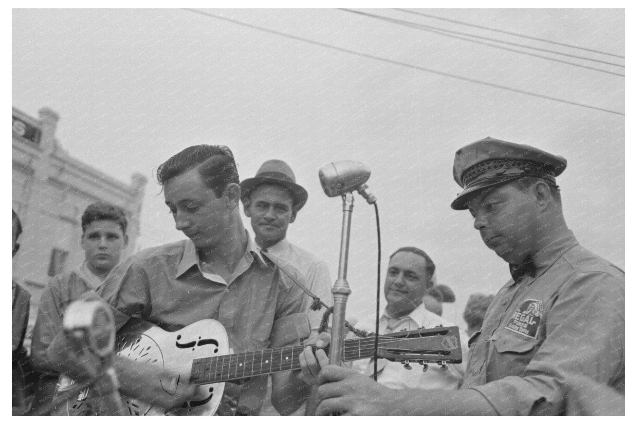 Cajun Guitar Player at National Rice Festival 1938 - Available at KNOWOL