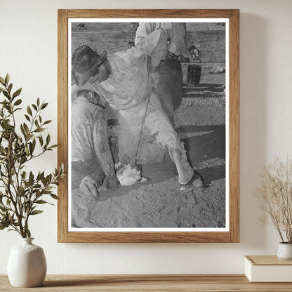 Calf Horn Burning Process at Walking X Ranch 1939 - Available at KNOWOL