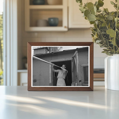Camp Cook Blowing Dinner Horn at Lumber Camp 1937 - Available at KNOWOL