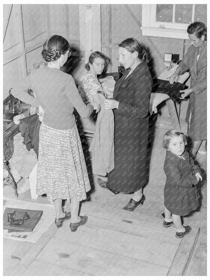 Camper Receives Coat Fitting Assistance November 1938 - Available at KNOWOL