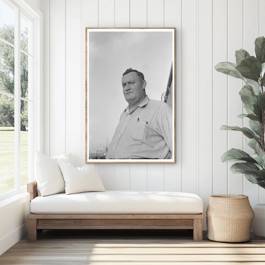 Captain of El Rito Navigating Mississippi River 1938 - Available at KNOWOL