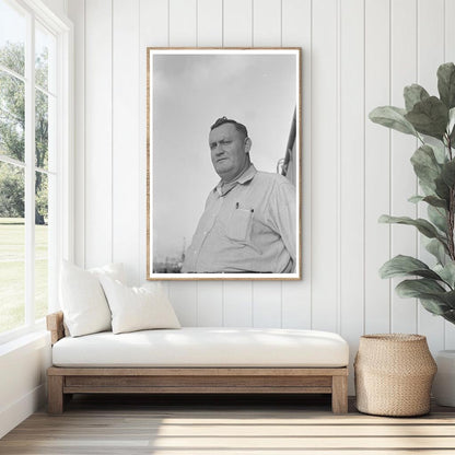 Captain of El Rito Navigating Mississippi River 1938 - Available at KNOWOL