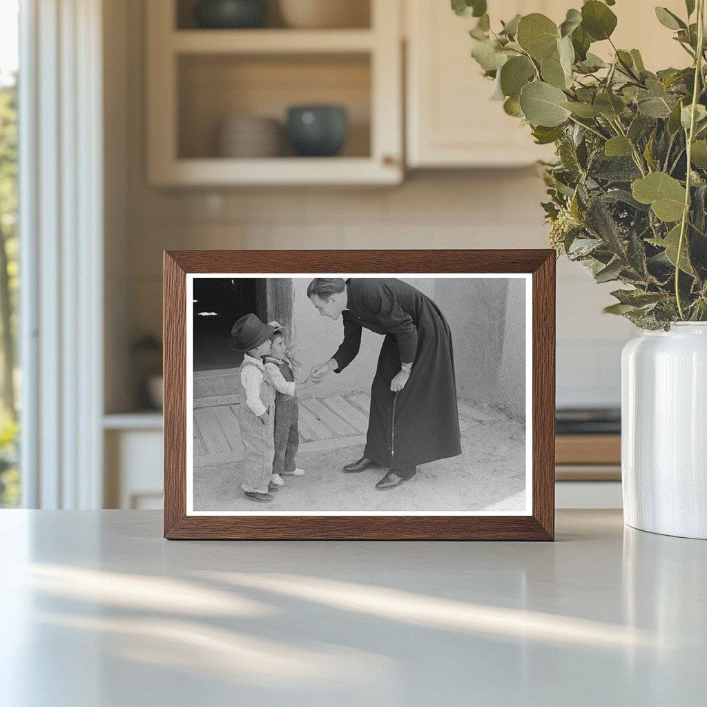 Catholic Priest Greets Boy After Mass Trampas New Mexico 1940 - Available at KNOWOL