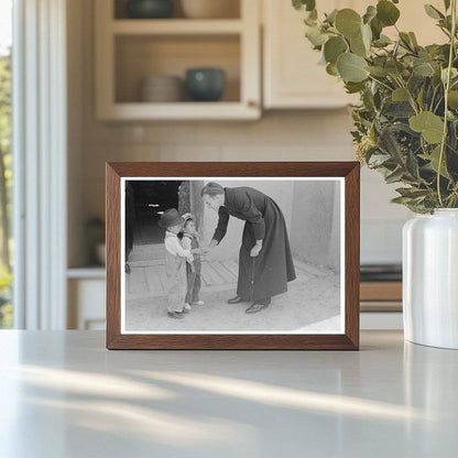 Catholic Priest Greets Boy in Trampas New Mexico 1940 - Available at KNOWOL