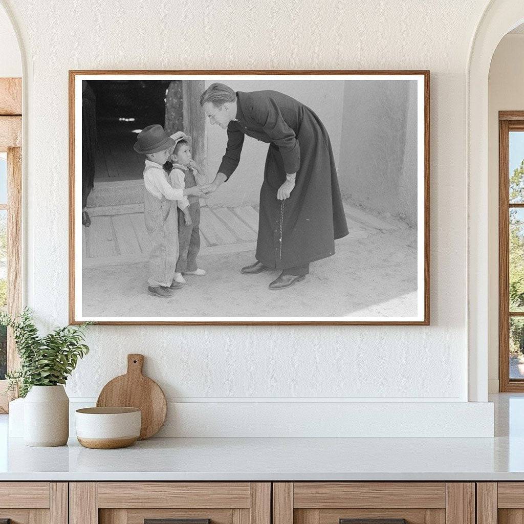Catholic Priest Greets Boy in Trampas New Mexico 1940 - Available at KNOWOL