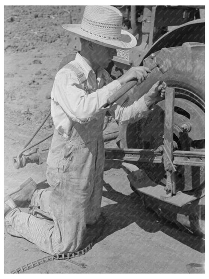 Chain Repair by Day Laborer on Texas Farm May 1939 - Available at KNOWOL