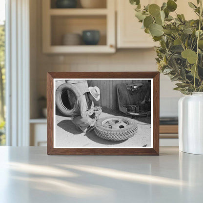 Changing a Tire at a Garage in Pie Town New Mexico 1940 - Available at KNOWOL