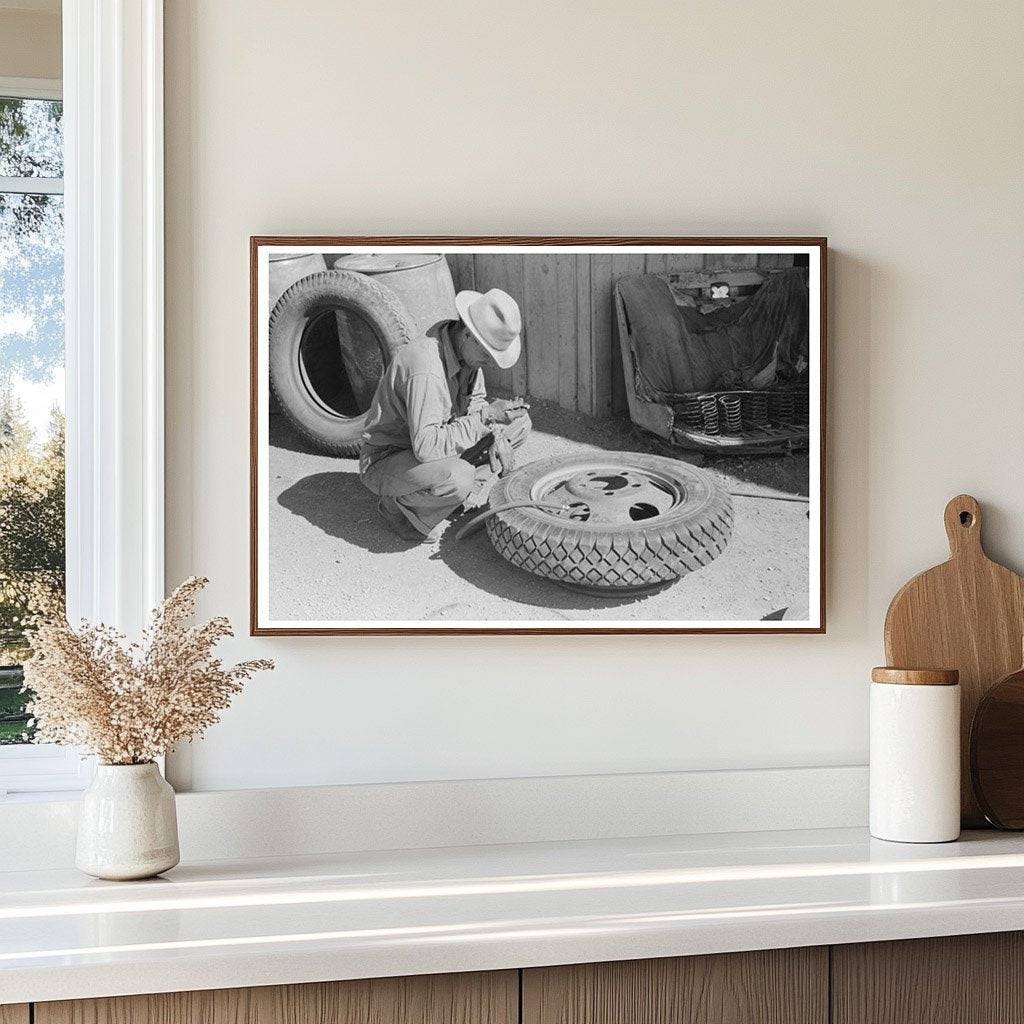 Changing a Tire at a Garage in Pie Town New Mexico 1940 - Available at KNOWOL