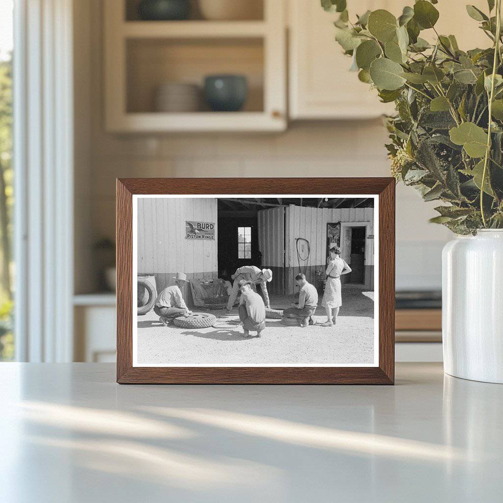 Changing a Tire in Pie Town New Mexico June 1944 - Available at KNOWOL