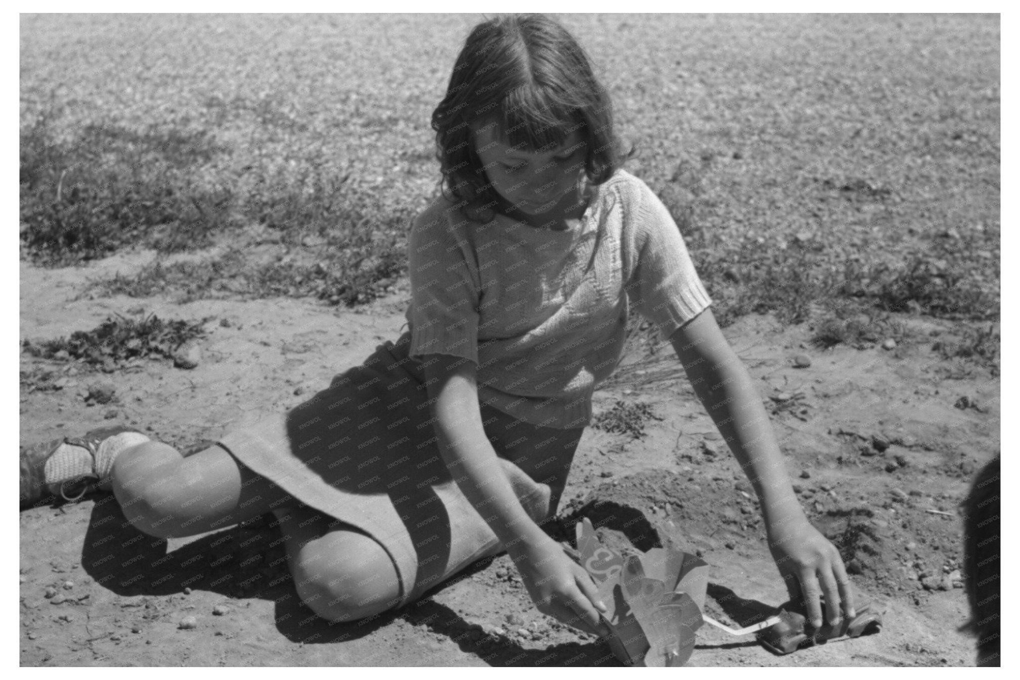 Child at Farm Security Administration Camp Caldwell Idaho 1941 - Available at KNOWOL