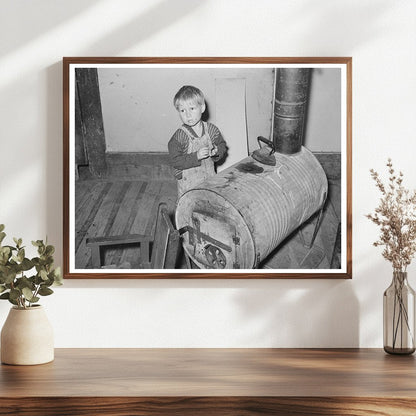 Child by Oil Drum Stove in Jefferson Texas April 1939 - Available at KNOWOL