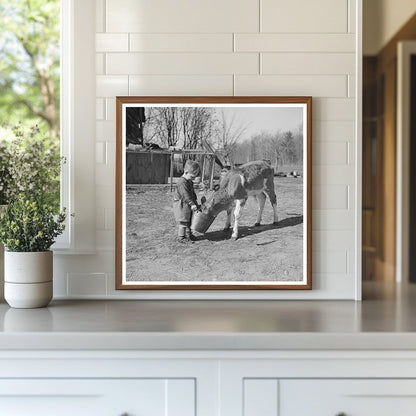 Child Feeding Calf on Farm in Gibbs City Michigan 1937 - Available at KNOWOL