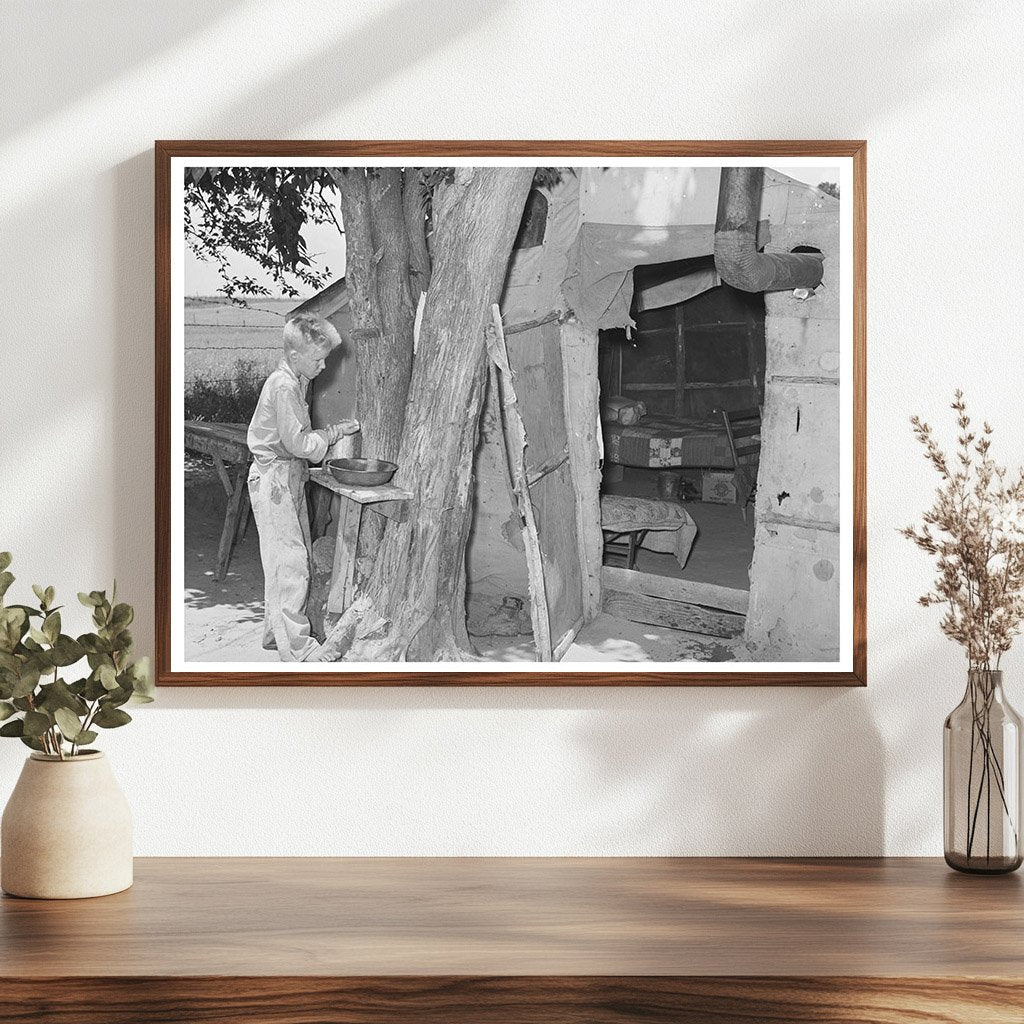 Child Laborer Washing Up in Tent Home 1939 - Available at KNOWOL