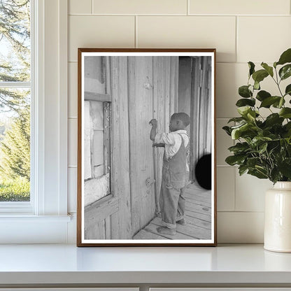 Child Playing Primitive Instrument in New Madrid County 1938 - Available at KNOWOL