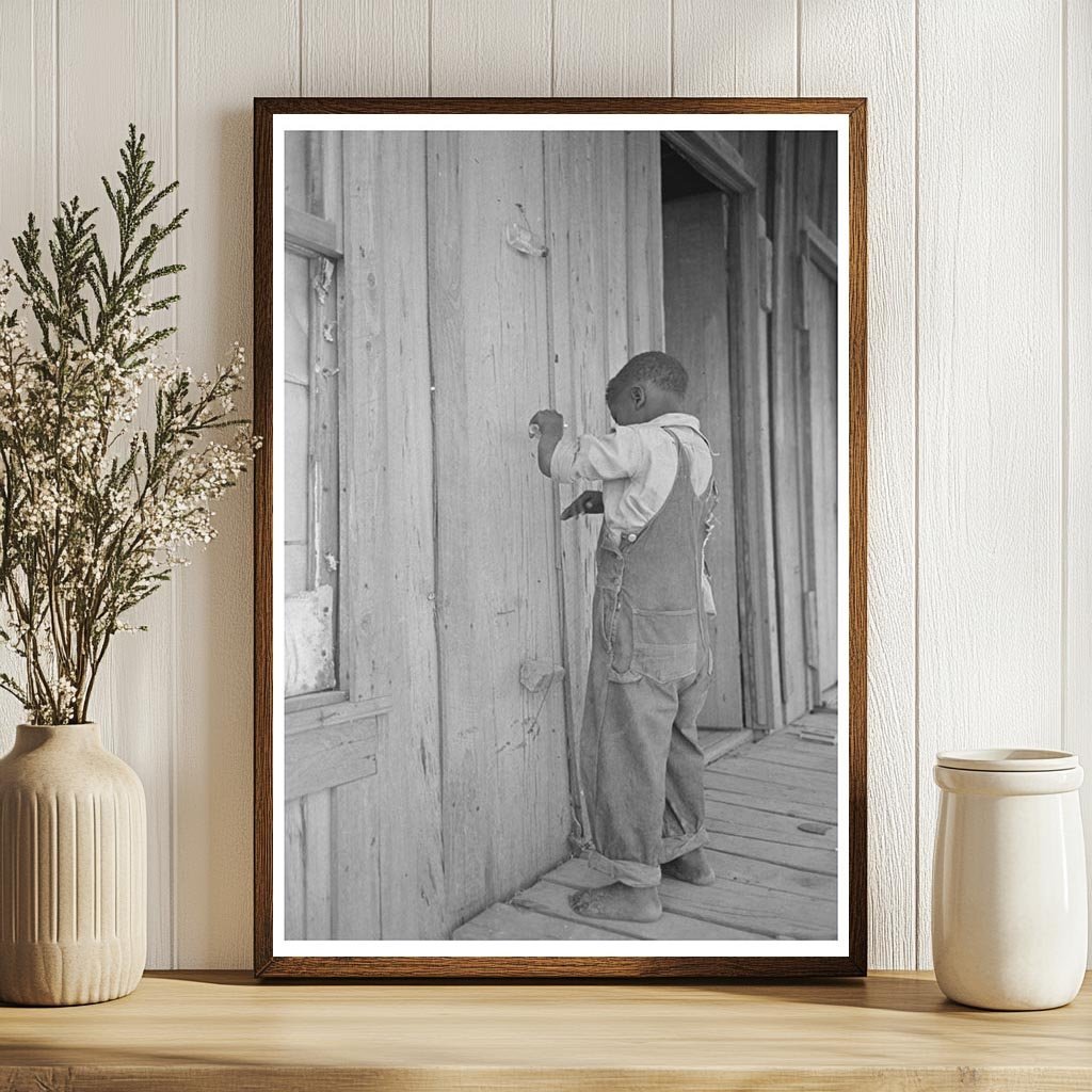 Child Playing Primitive Instrument Southeast Missouri Farms 1938 - Available at KNOWOL