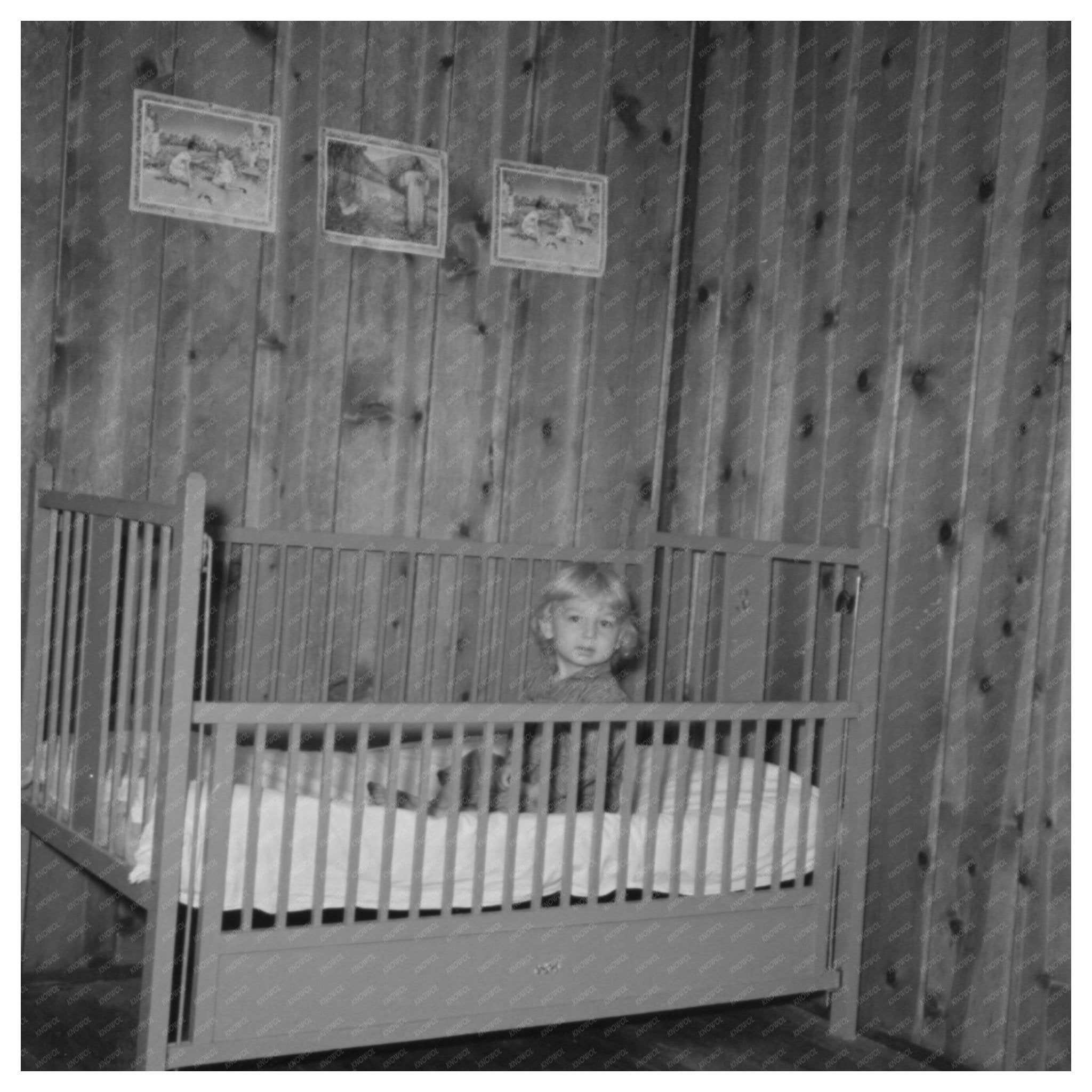 Child Resting in Bed at Farm Home Arkansas 1938 - Available at KNOWOL