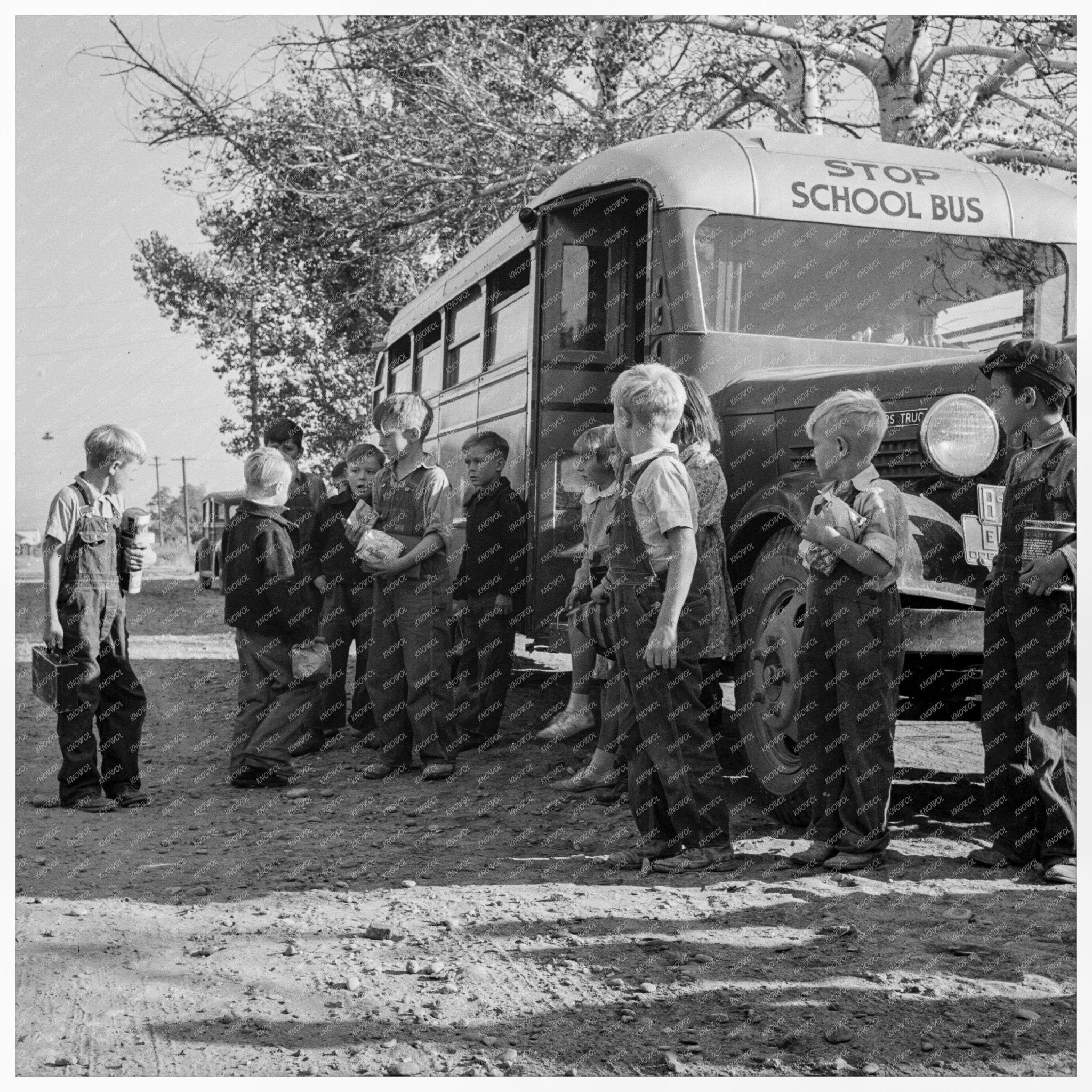 Children Arriving at School Bus in Ontario Oregon 1939 - Available at KNOWOL