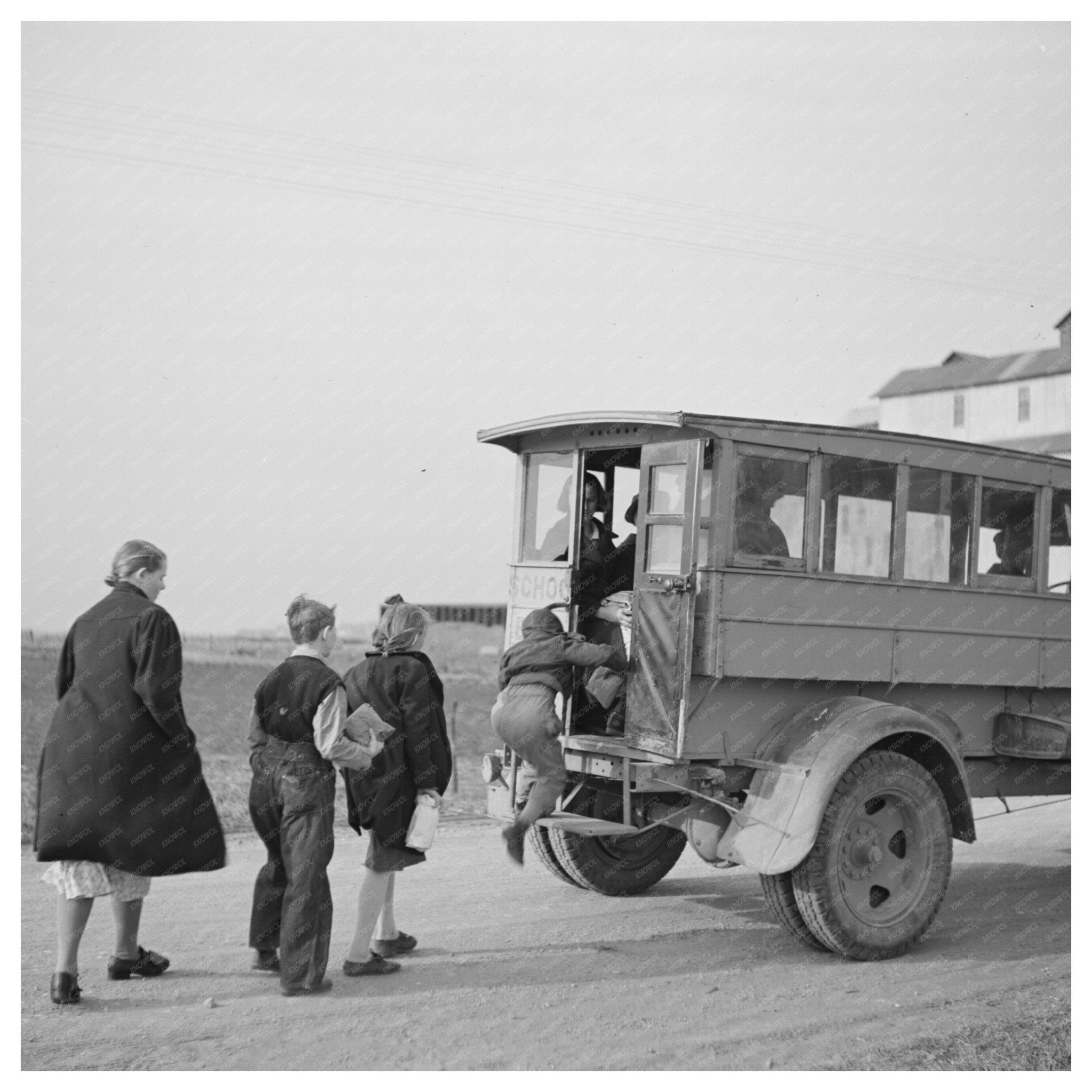 Children Boarding School Bus Fowler Indiana April 1937 - Available at KNOWOL