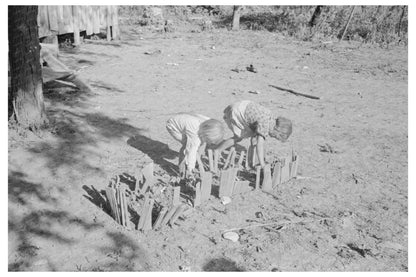 Children of Sharecropper Tending Garden New Madrid County 1938 - Available at KNOWOL