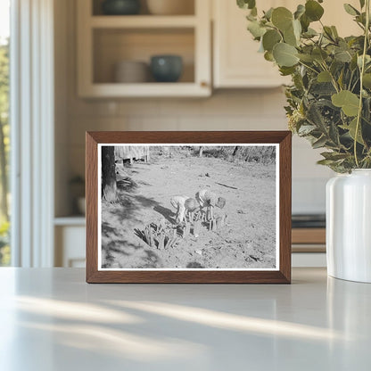 Children of Sharecropper Tending Garden New Madrid County 1938 - Available at KNOWOL