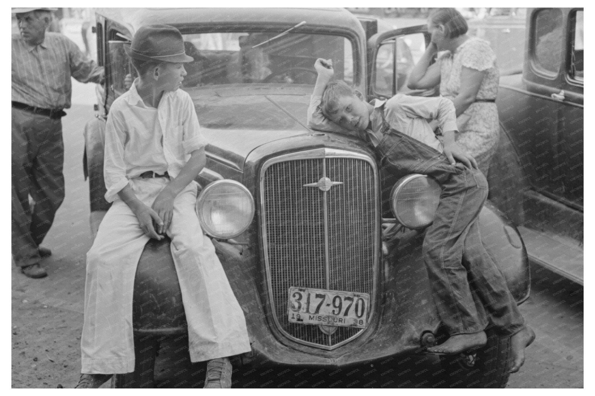 Children on Car Fenders Steele Missouri August 1938 - Available at KNOWOL