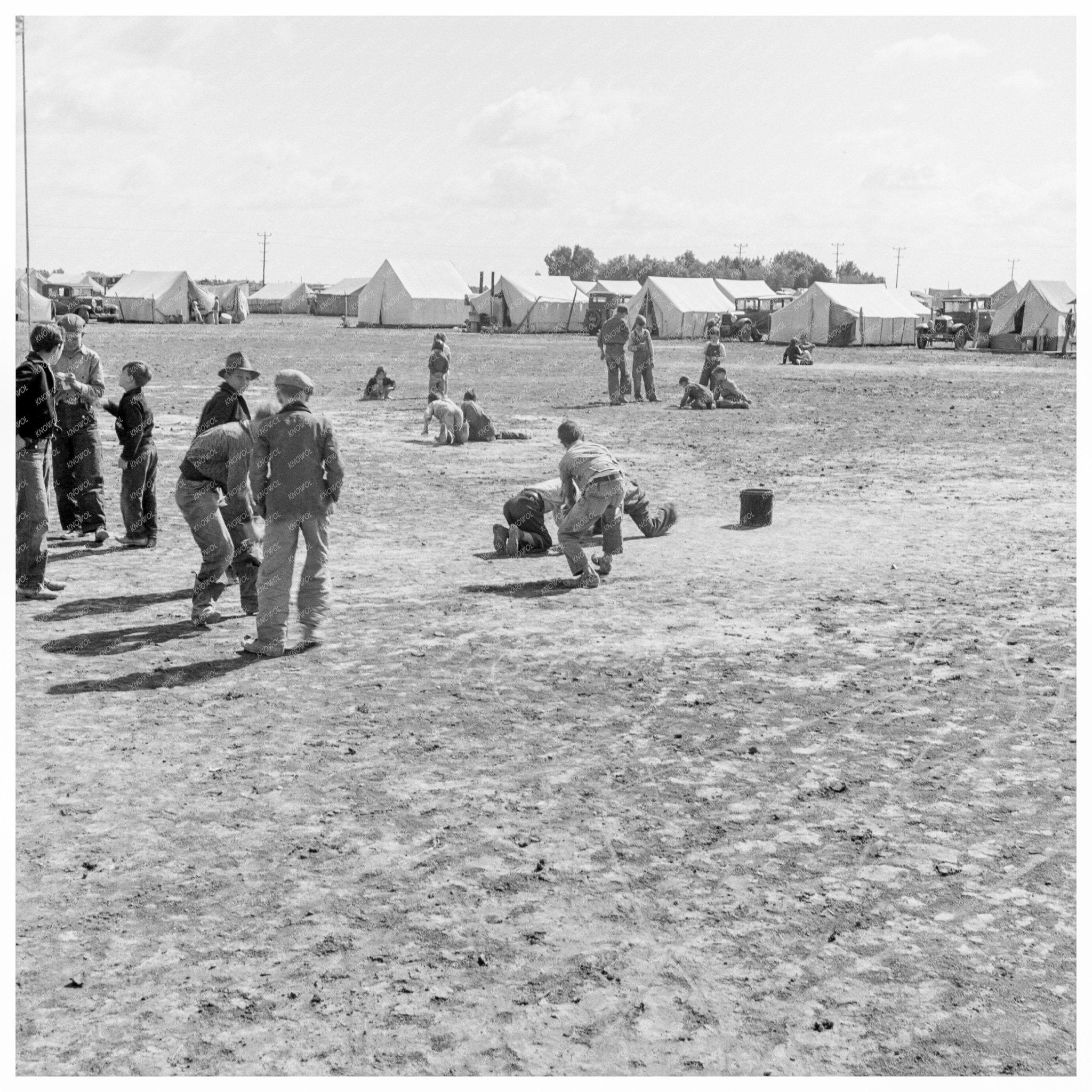 Children Playing at Migratory Labor Camp February 1939 - Available at KNOWOL