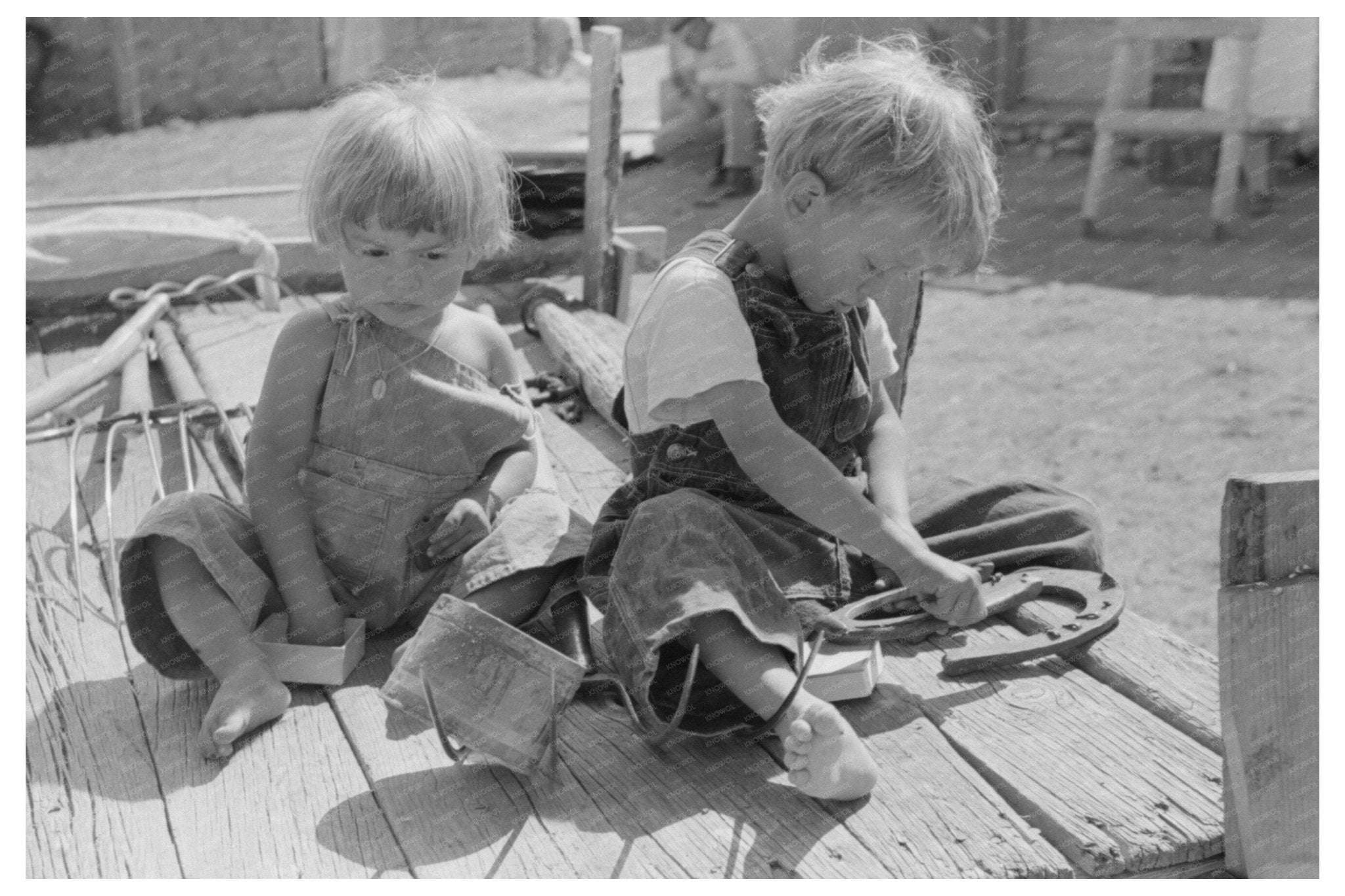 Children Playing on Wagon in Taos County New Mexico 1939 - Available at KNOWOL
