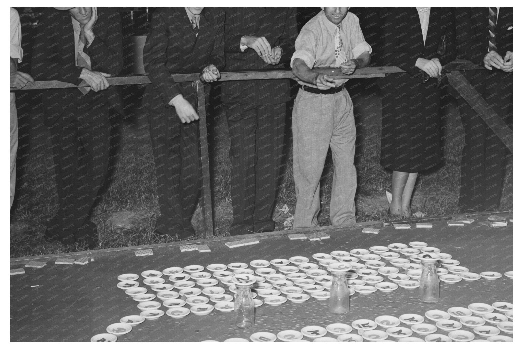 Children Playing Pitching Pennies at 1938 Louisiana Fair - Available at KNOWOL