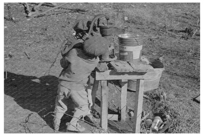 Children Pumping Water in Louisiana 1939 - Available at KNOWOL