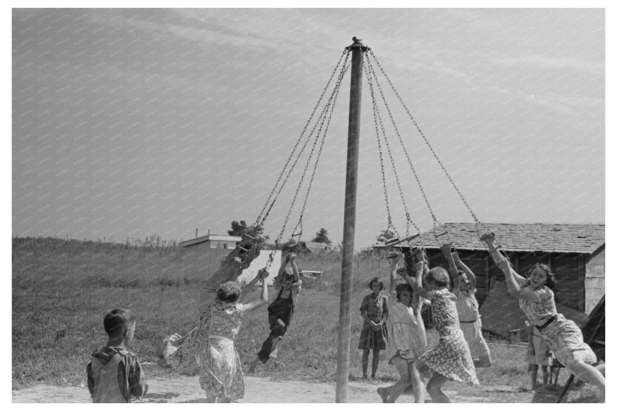 Children Swinging on Maypole in La Forge Missouri 1938 - Available at KNOWOL