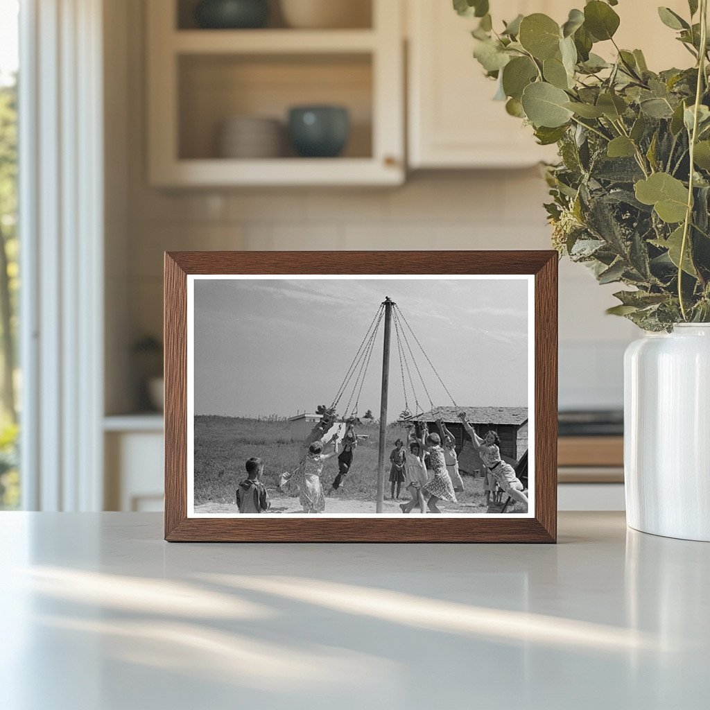 Children Swinging on Maypole in La Forge Missouri 1938 - Available at KNOWOL