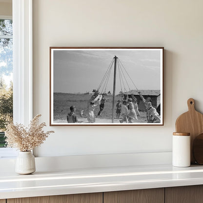 Children Swinging on Maypole in La Forge Missouri 1938 - Available at KNOWOL