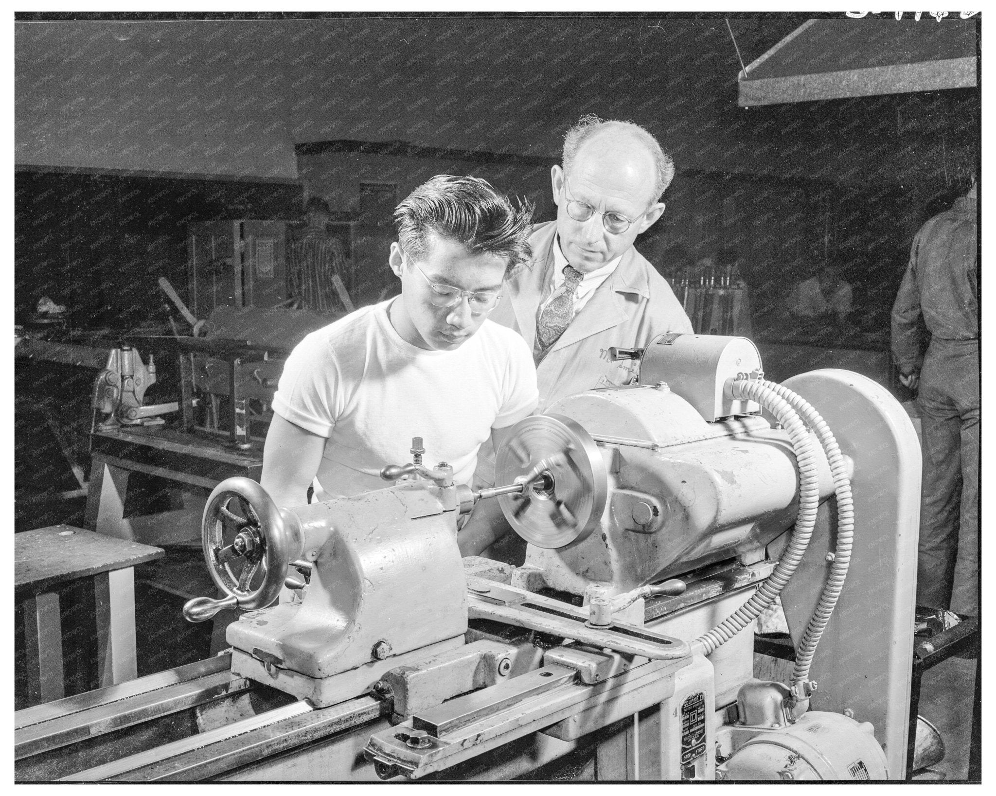 Chinese Student Operating Lathe at Polytechnic High School 1942 - Available at KNOWOL