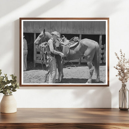 Cinch Tightening on Cow Pony at SMS Ranch Texas 1939 - Available at KNOWOL