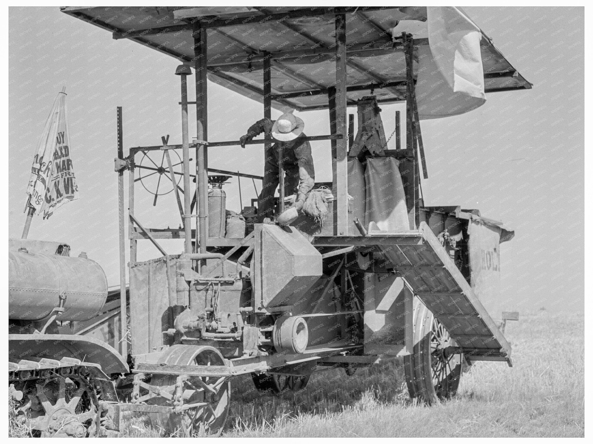 Combine Harvester in Wheat Field San Joaquin Valley 1938 - Available at KNOWOL