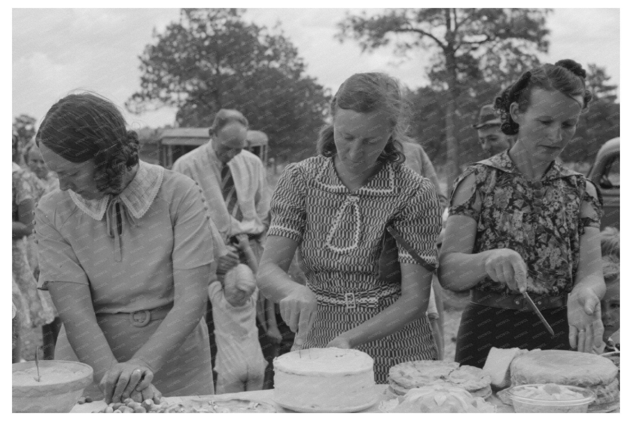 Community Cake Cutting in Pie Town New Mexico 1940 - Available at KNOWOL