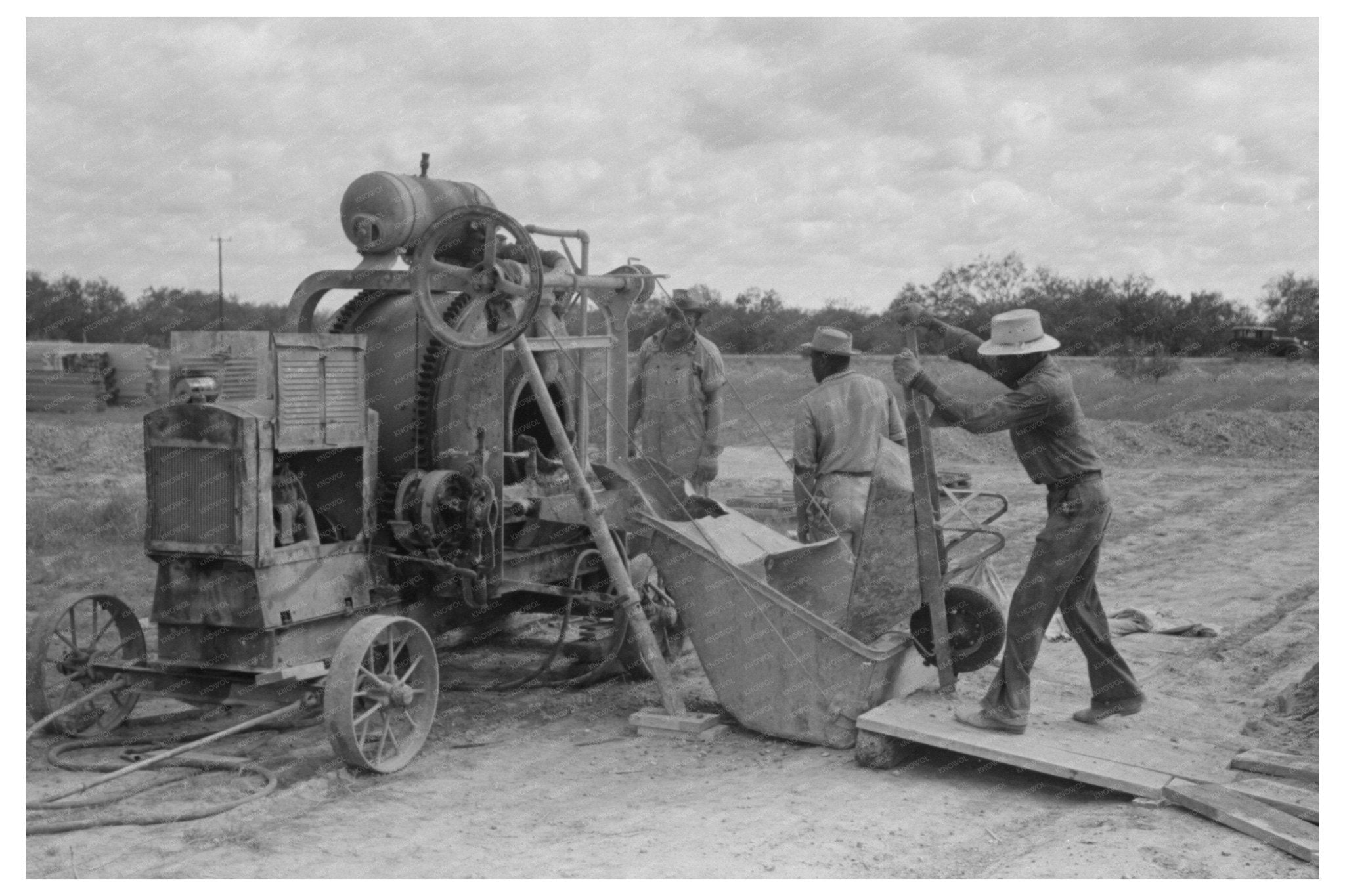 Concrete Mixer at Migrant Camp Sinton Texas 1939 - Available at KNOWOL