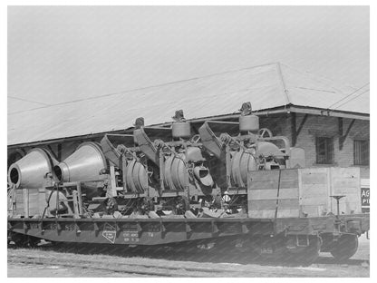 Concrete Mixers on Flatcar Eagle Pass Texas March 1939 - Available at KNOWOL