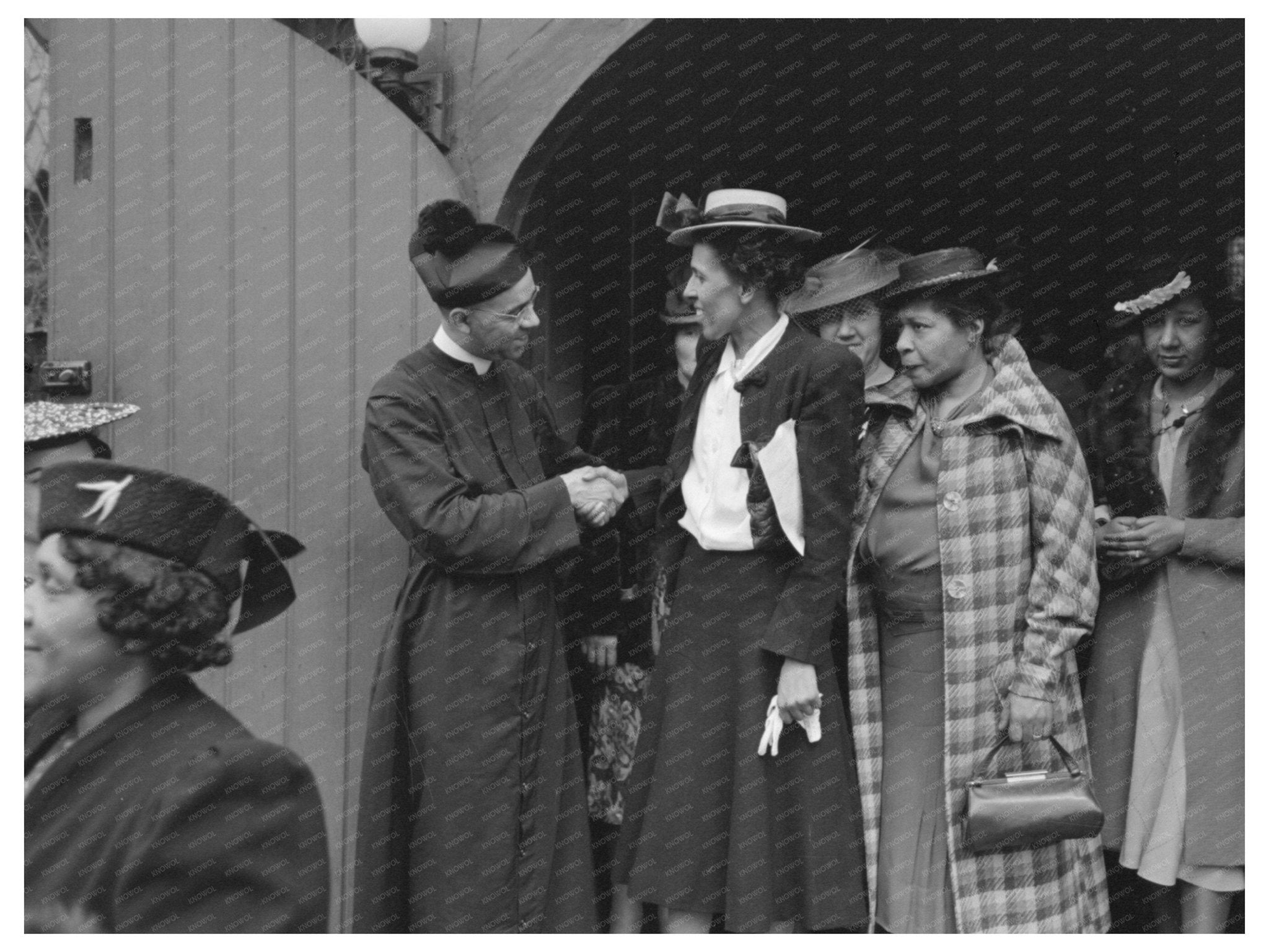 Congregation Members Shake Hands at Episcopal Church 1941 - Available at KNOWOL