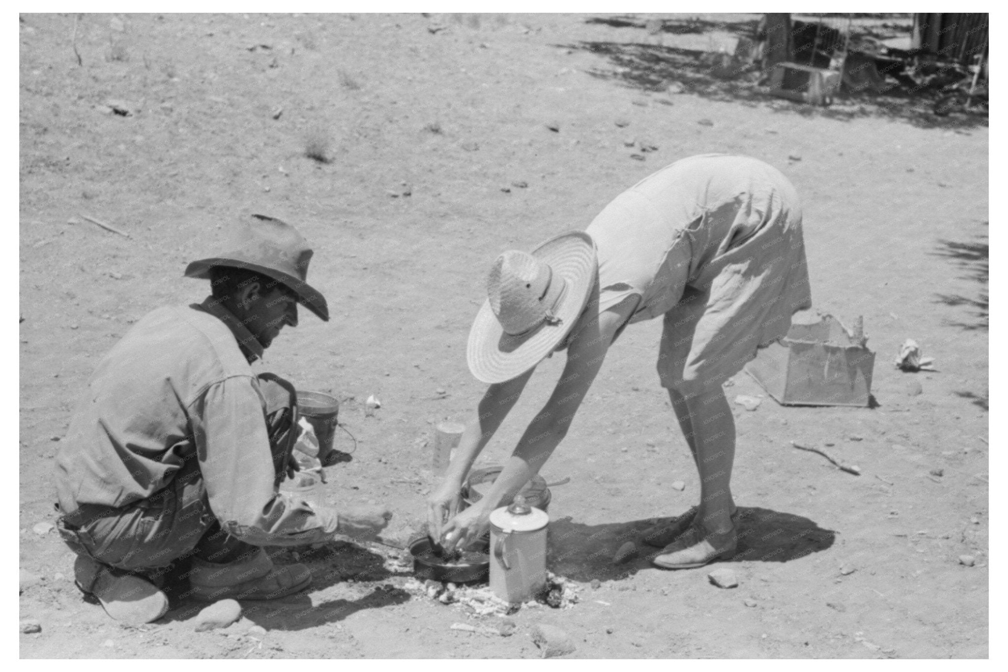 Cooking Dinner Over Campfire in Pie Town New Mexico 1940 - Available at KNOWOL
