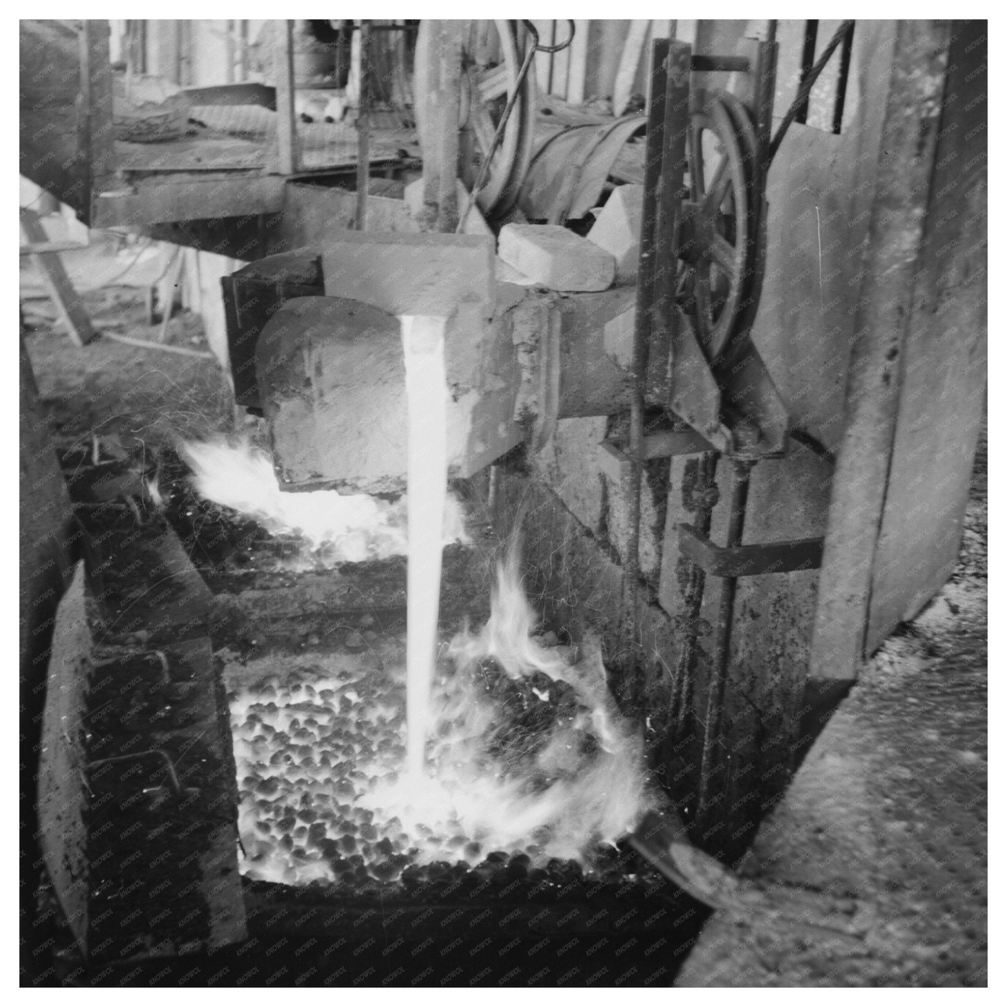 Copper Ingots Being Poured at Phelps - Dodge 1942 - Available at KNOWOL