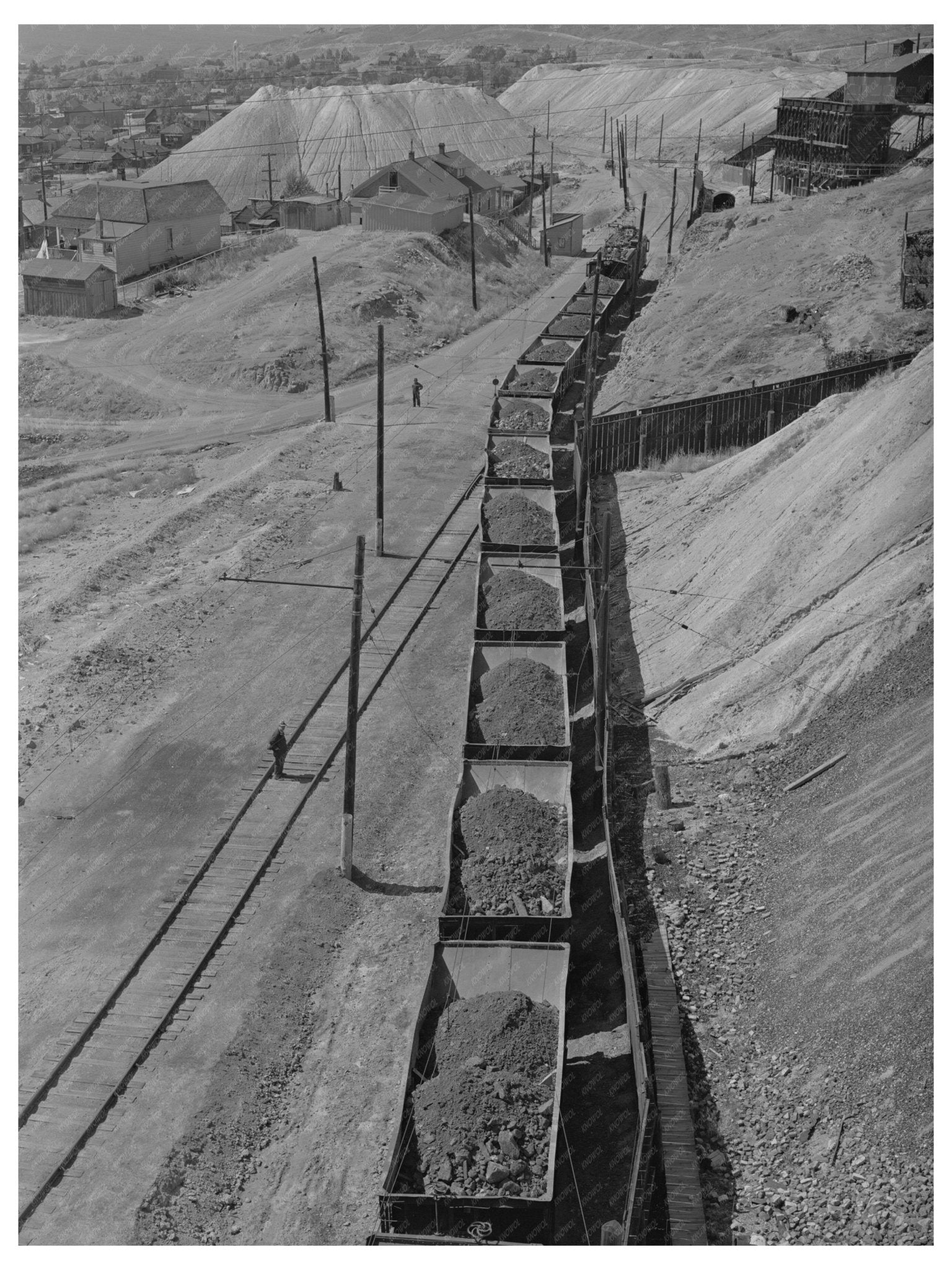 Copper Ore Cars Departing Butte Montana 1942 - Available at KNOWOL