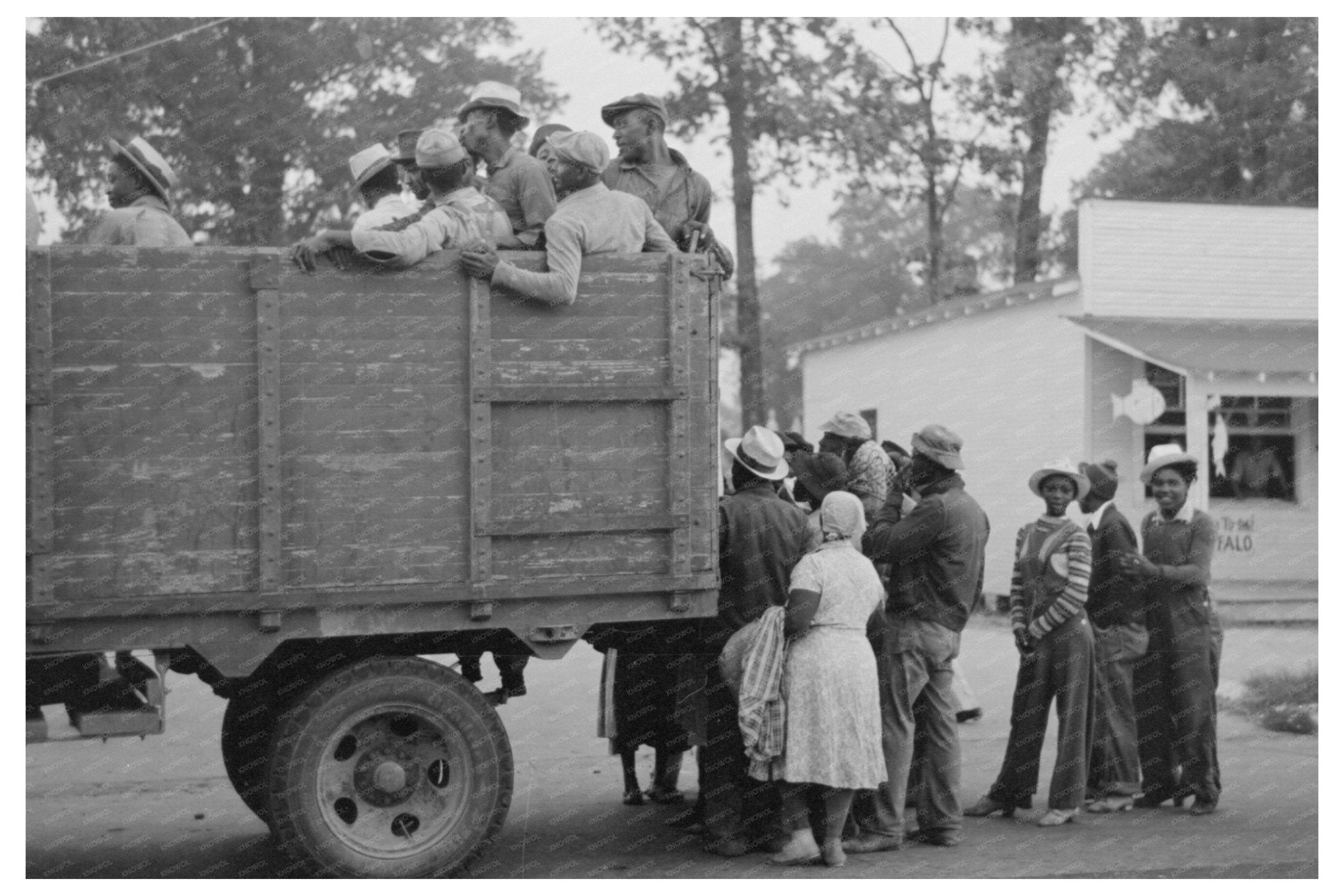 Cotton Pickers Loading Truck in Pine Bluff Arkansas 1938 - Available at KNOWOL