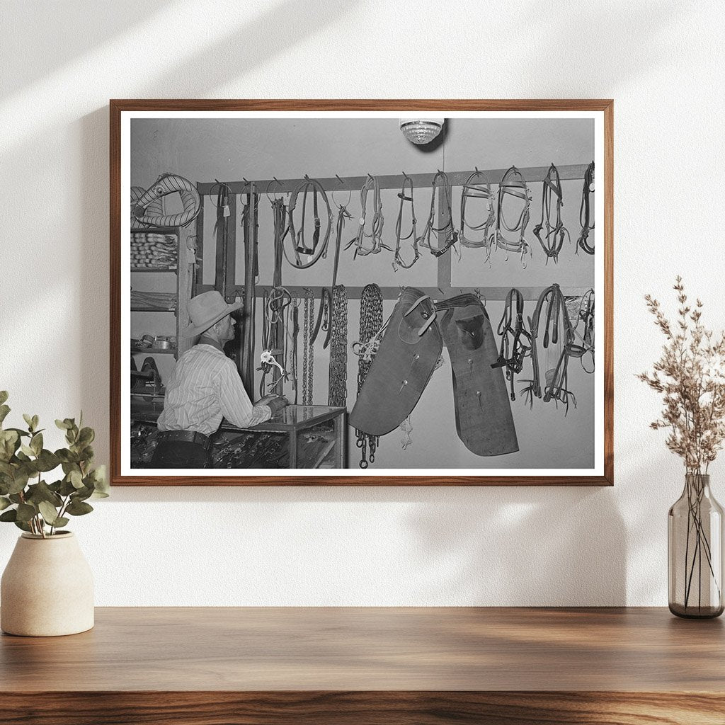 Cowboy Examining Ranch Supplies in Alpine Texas 1939 - Available at KNOWOL